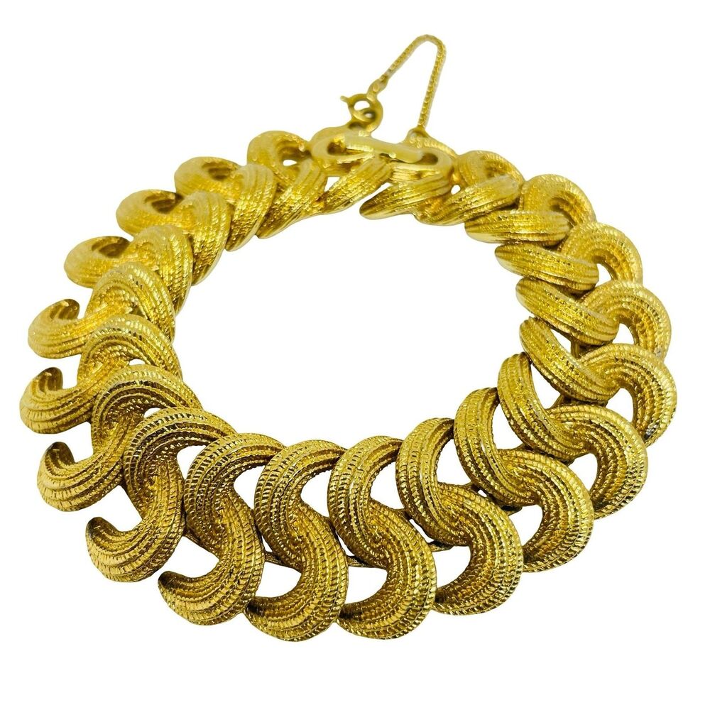 MONET signed vintage gold tone designer bracelet